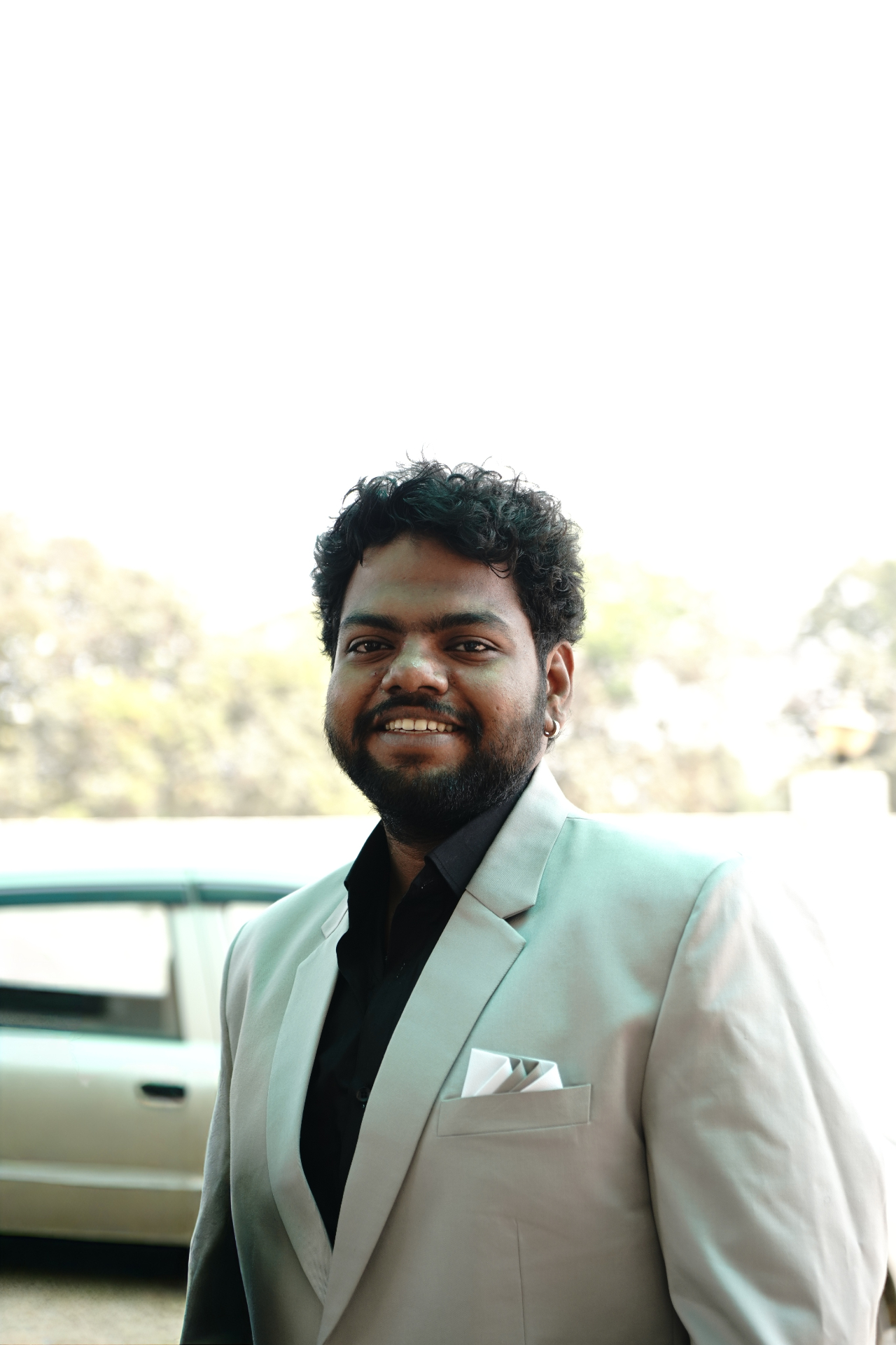 Siddardh portrait in white blazer